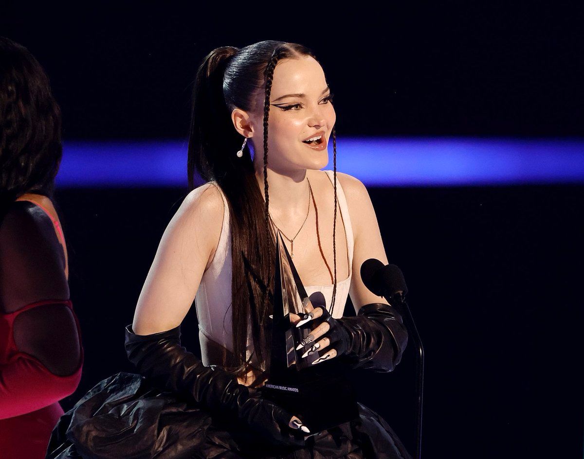 Dove Cameron remembers victims of Colorado LGBTQ club shooting in American Music Awards acceptance speech