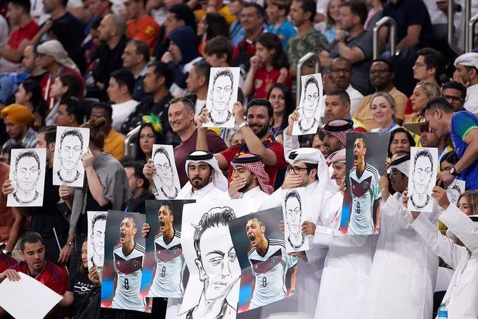 Fans hold Mesut Ozil’s photos, cover their mouths during Germany vs Spain FIFA World Cup 2022 game: Watch
