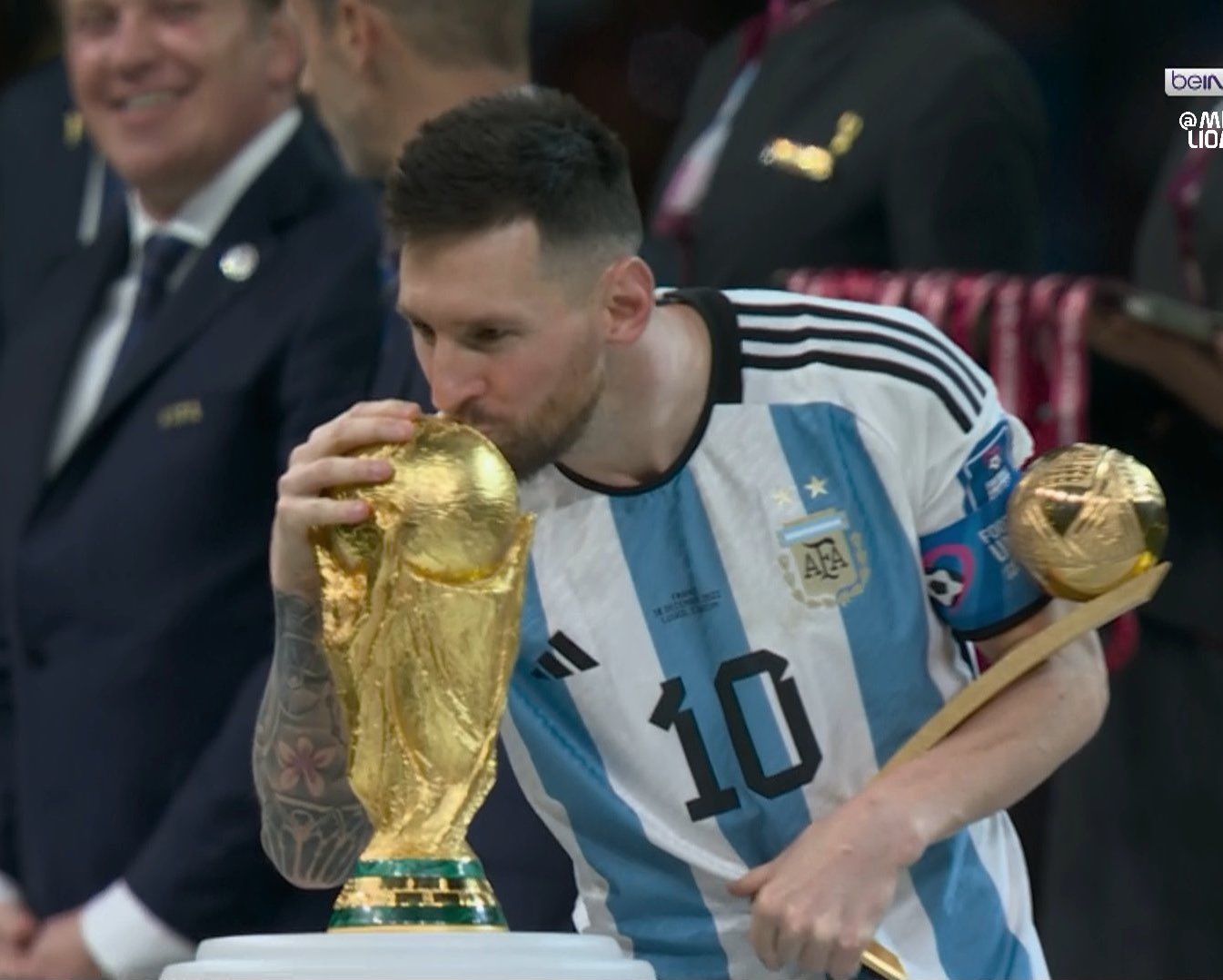 Lionel Messi kisses the World Cup trophy after Argentina beat France to