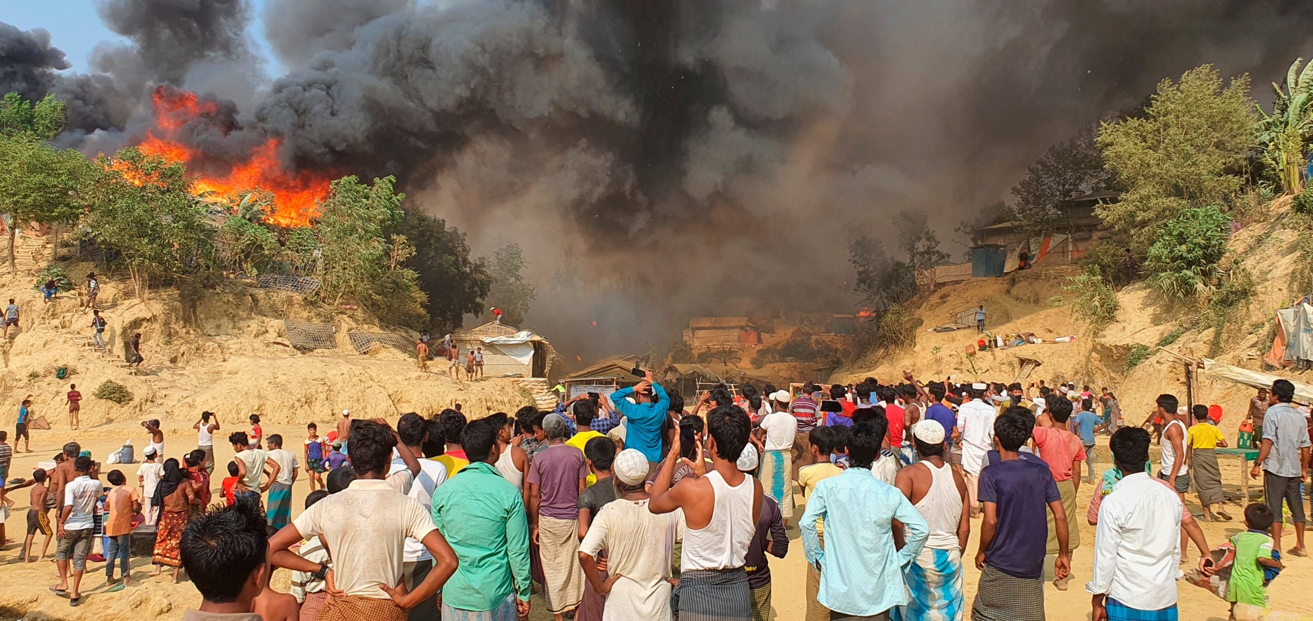 Tens of thousands flee huge blaze at Rohingya camp in Bangladesh