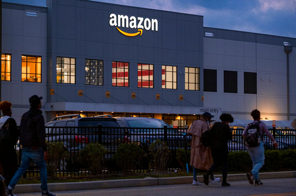 Amazon workers in NY warehouse vote to join first US union