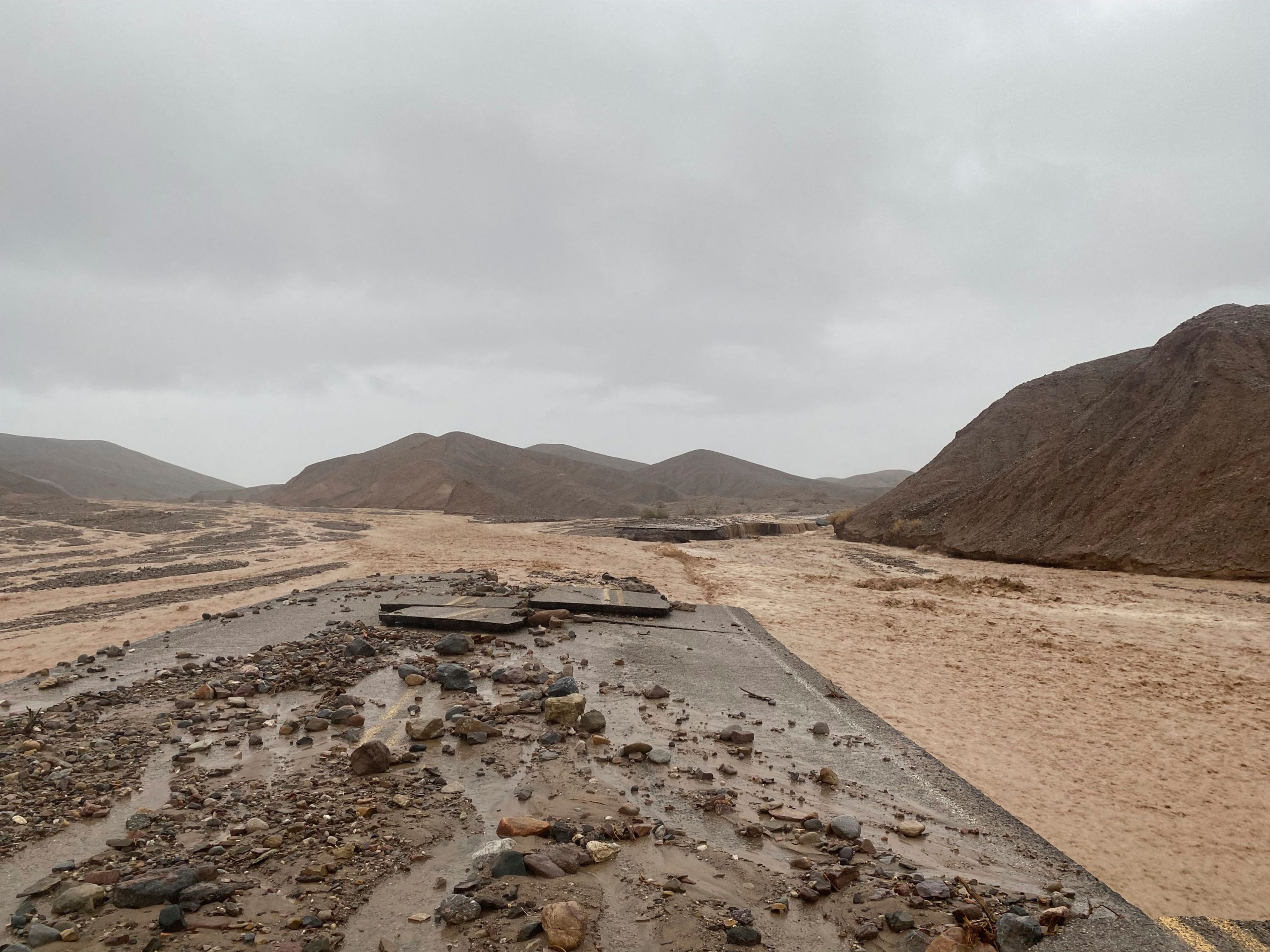 Death Valley route buried in floods shut for another week