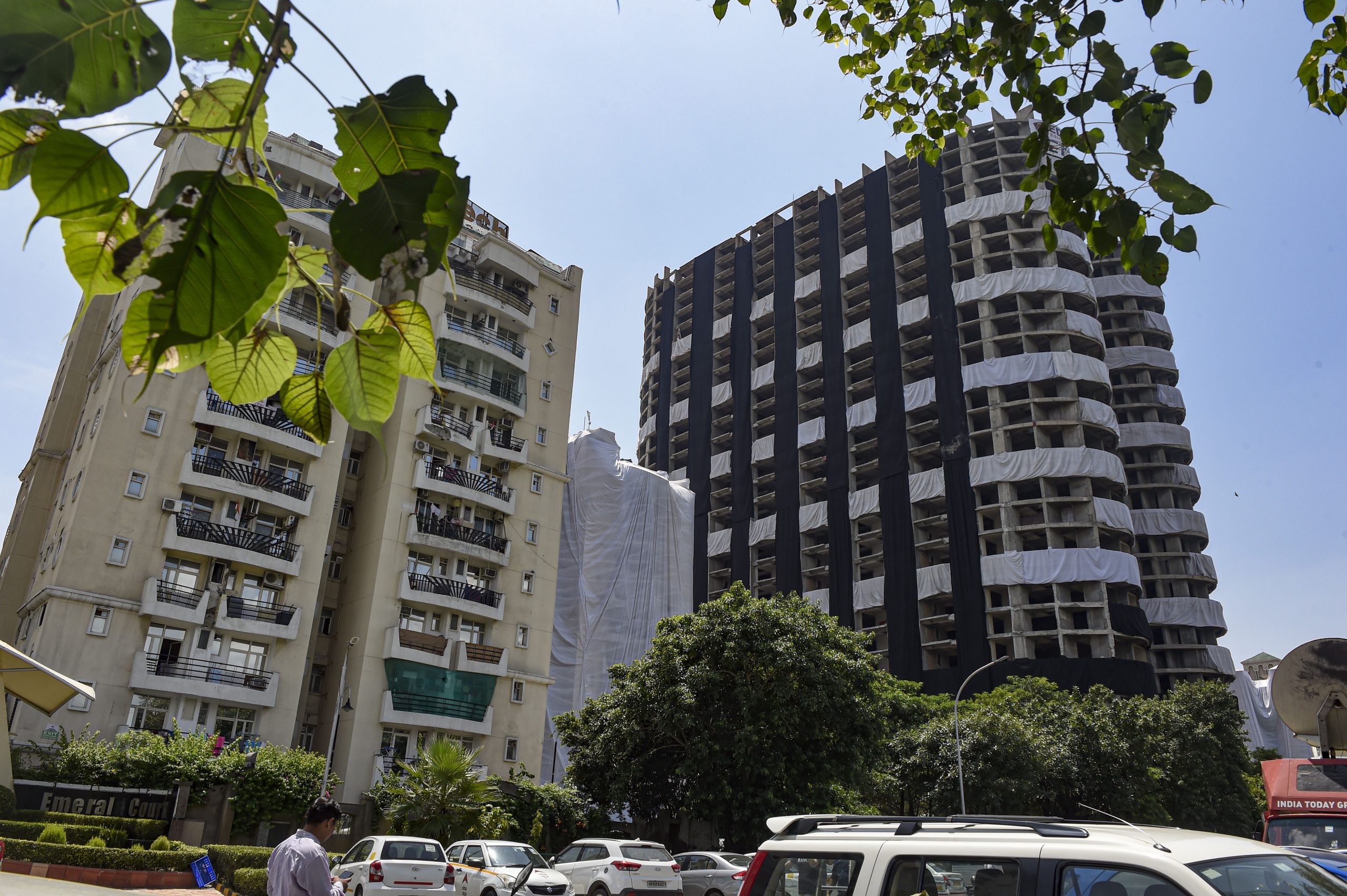 Why are Supertech twin towers in Noida being demolished