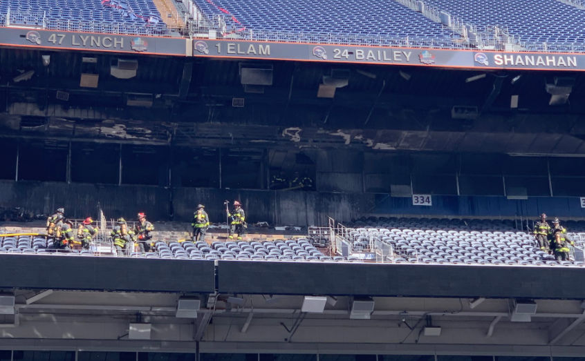 Denver Broncos Mile High Stadium on fire,  seats and suite area damaged