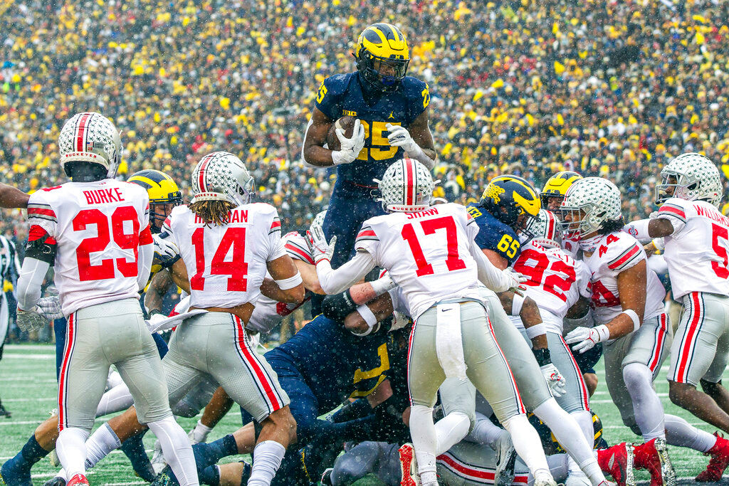 NCAA: Michigan beat Ohio State 42-27, end 8-game skid in rivalry