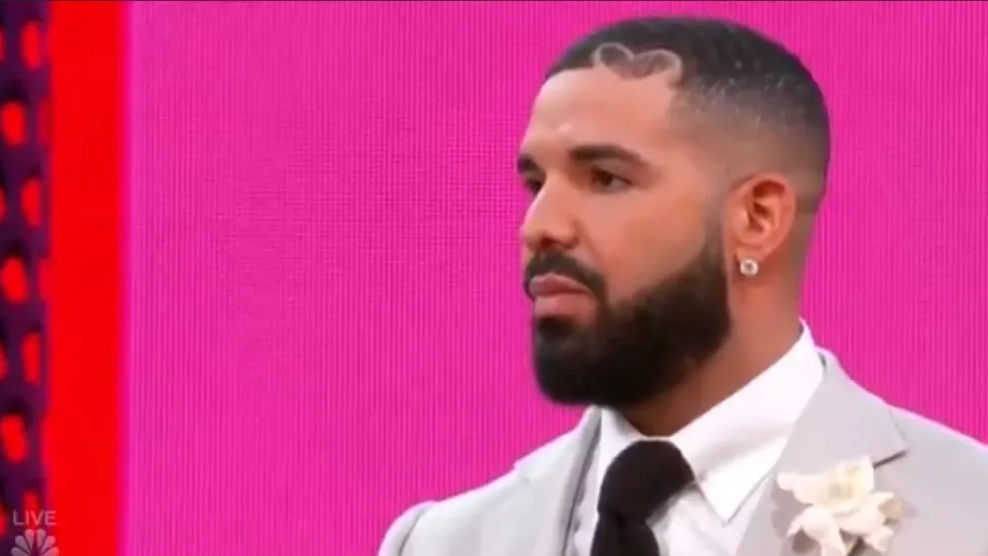 Watch: Drake brings son on BBMA stage to accept Artist of the Decade award