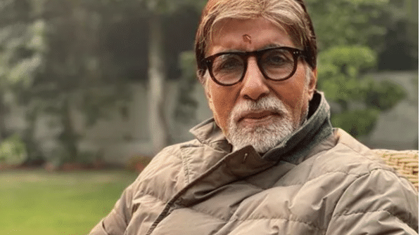 its back to work in a sea of blue PPE: Amitabh Bachchan