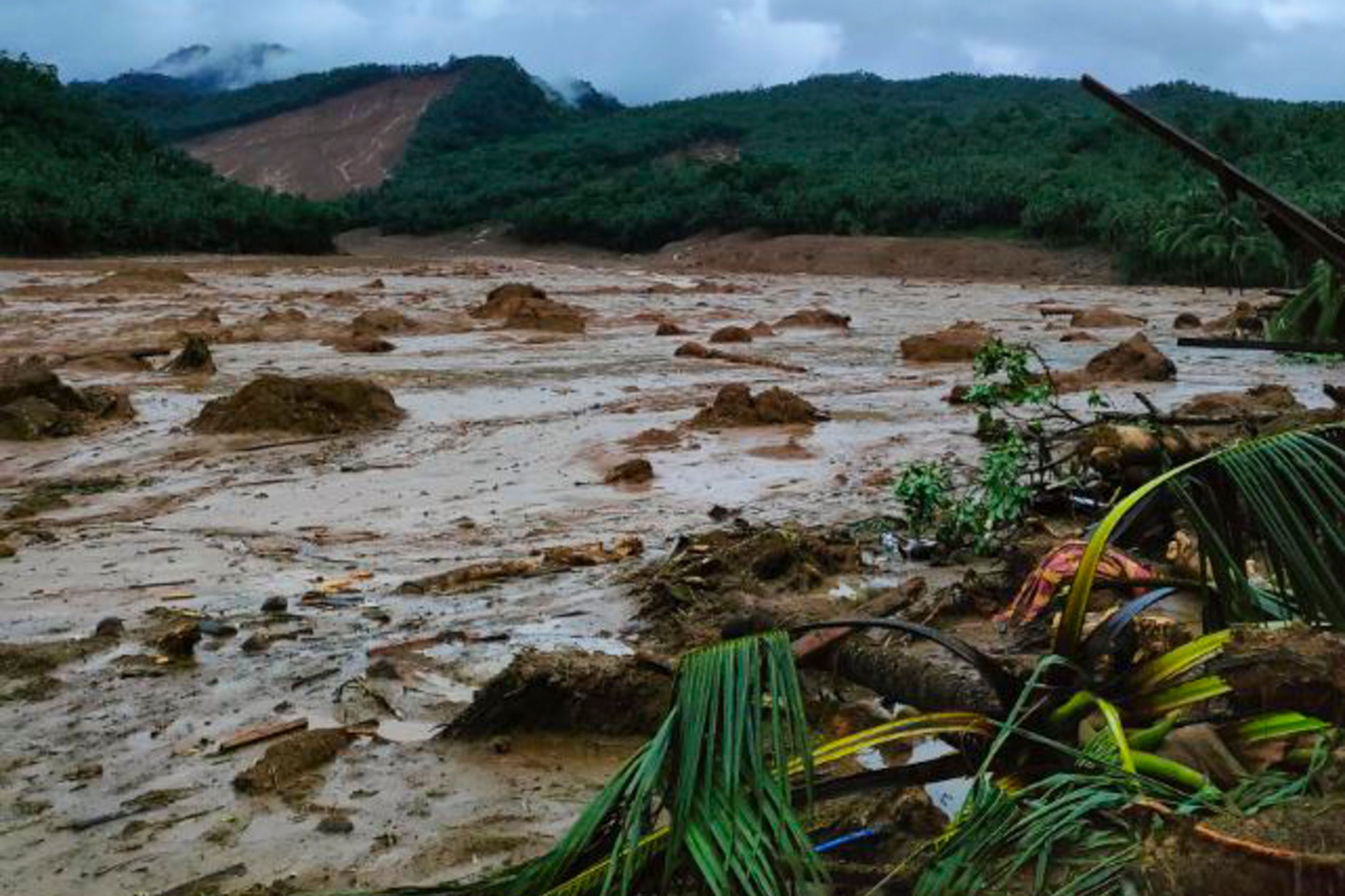 Philippines boy survives landslide by taking refuge in refrigerator for 20 hours