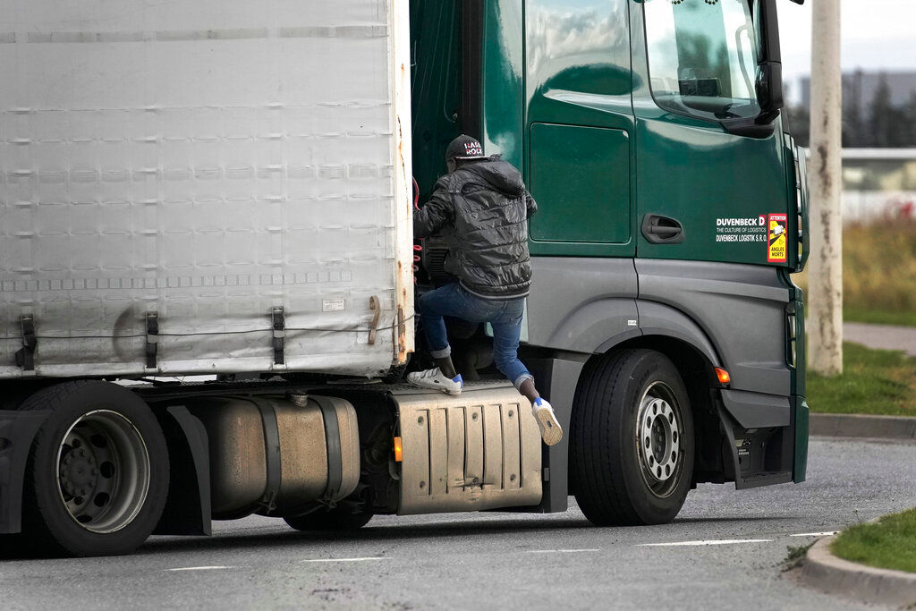 Jumping onto trucks to get to Britain: A migrant’s day