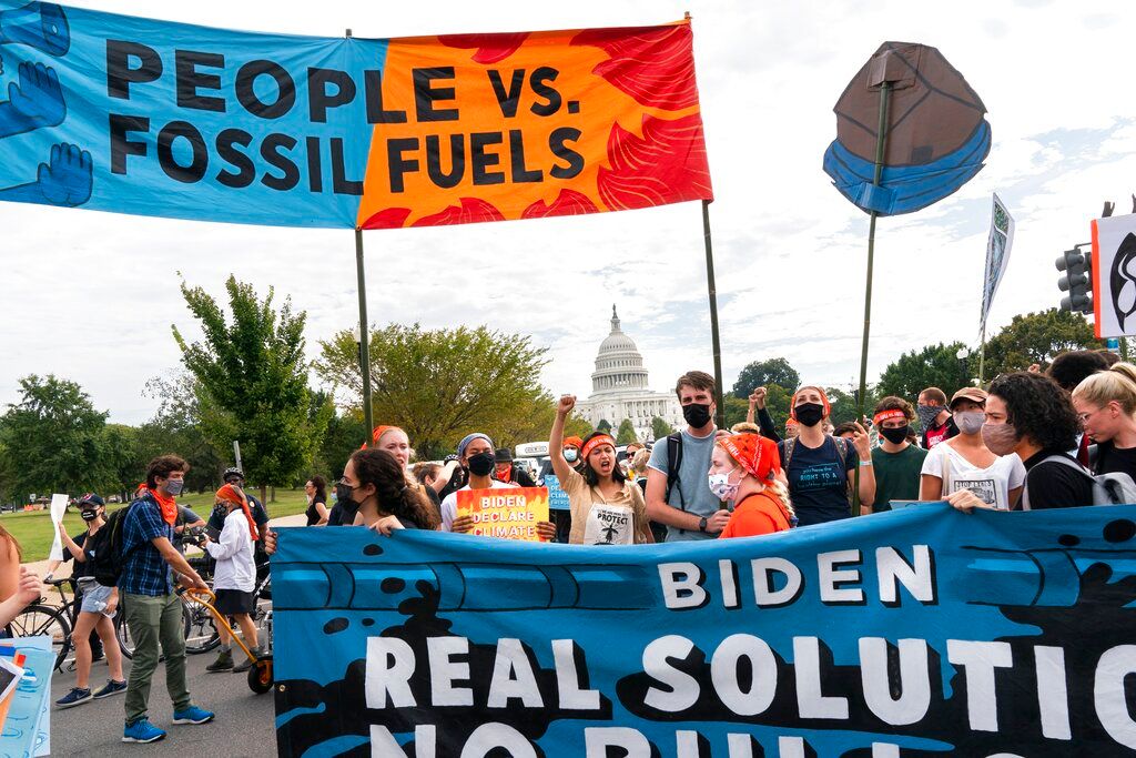 Climate activists resume Capitol protest demanding Joe Biden’s urgent action