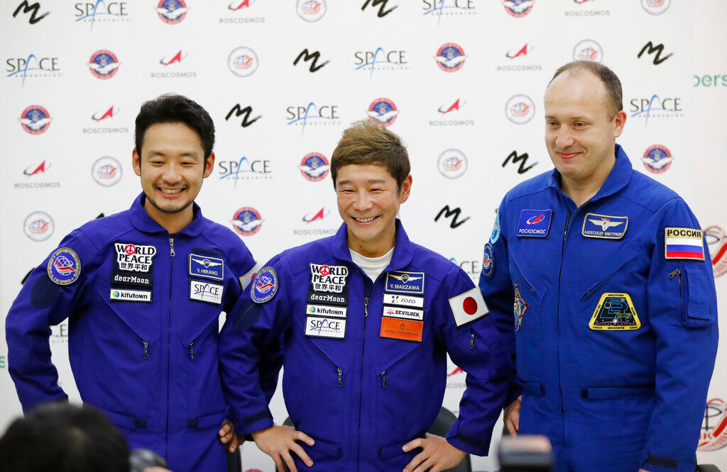 Japanese billionaire returns to Earth after spending 12 days on ISS