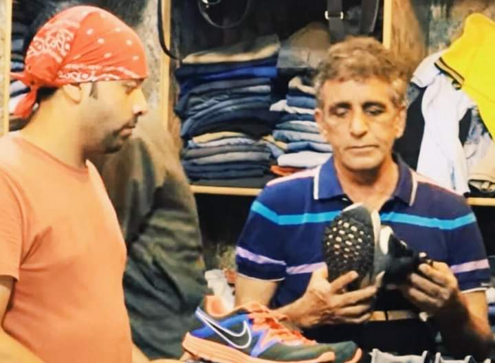 Asad Rauf, former ICC umpire, is now a shop owner in Lahore