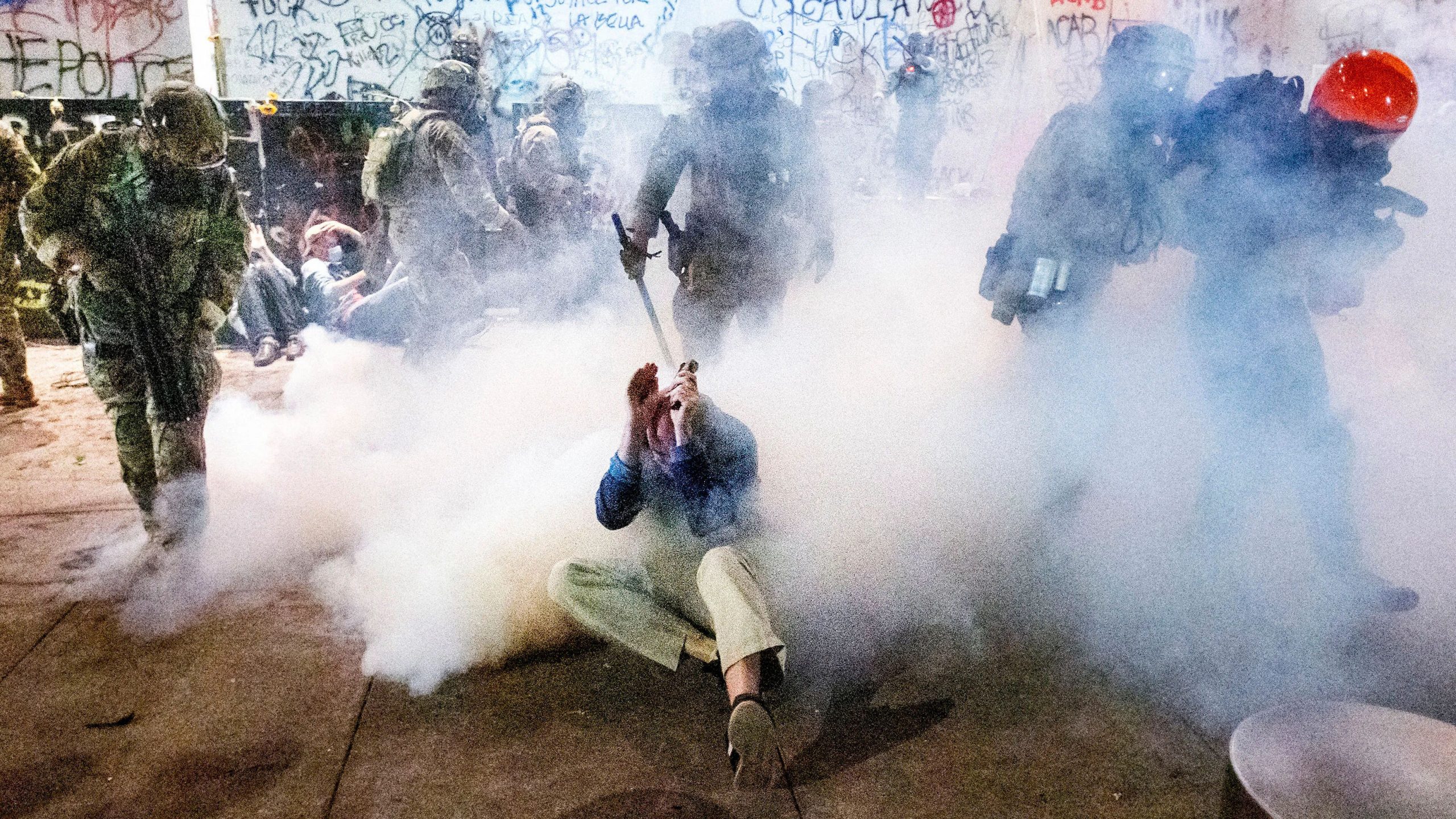Watch: Portland mayor teargassed at protest against federal crackdown