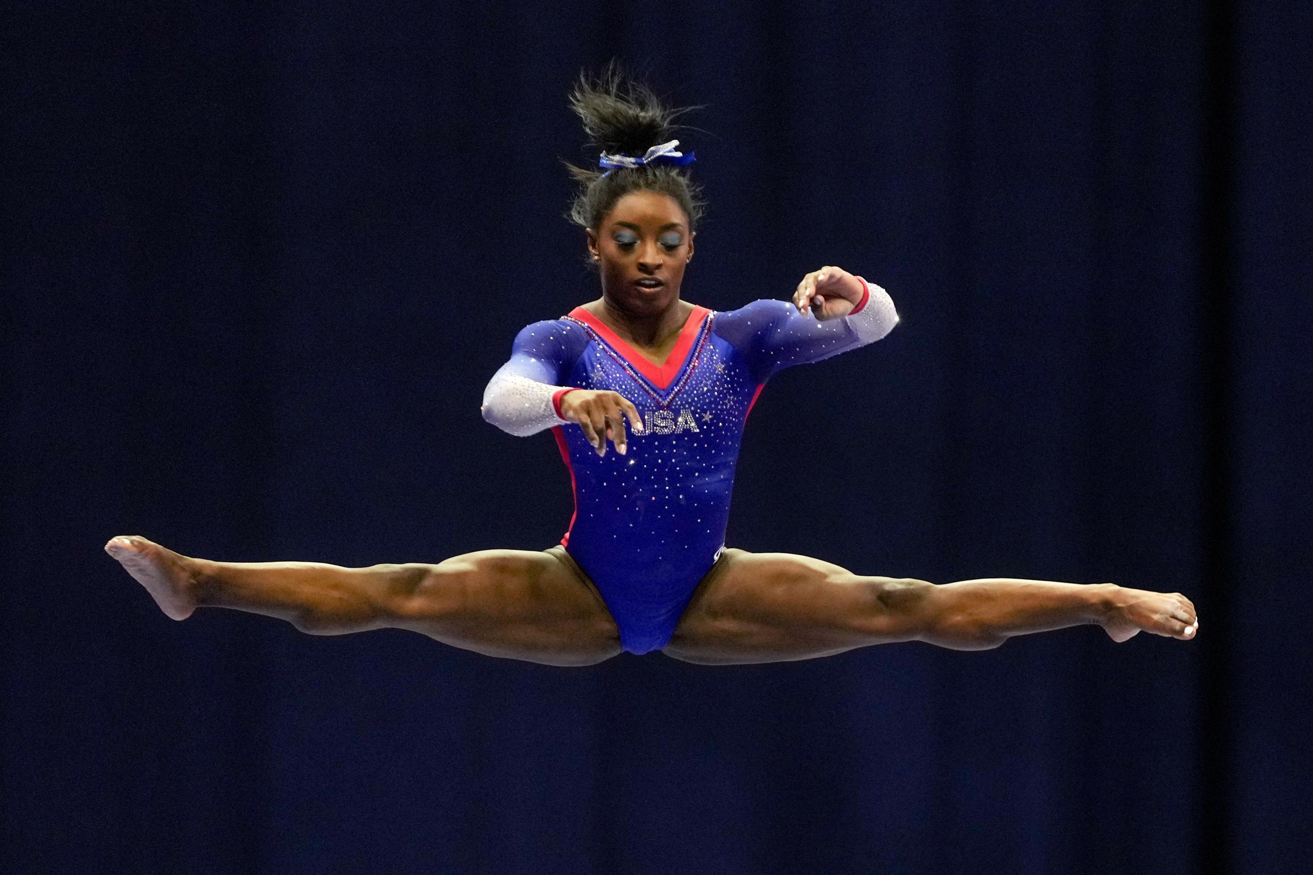 Olympic champion Simone Biles out of team finals with apparent injury