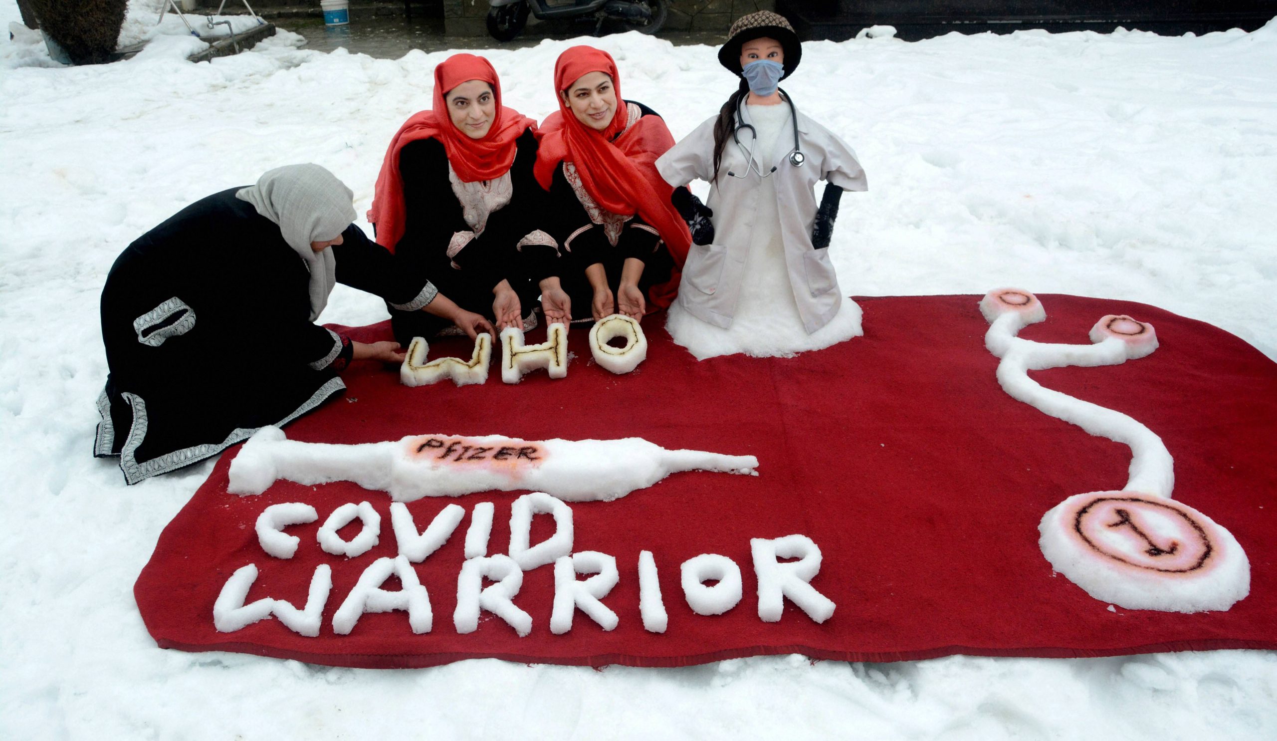 Kashmir sisters’ moving tribute to COVID-19 warriors through snow sculptures