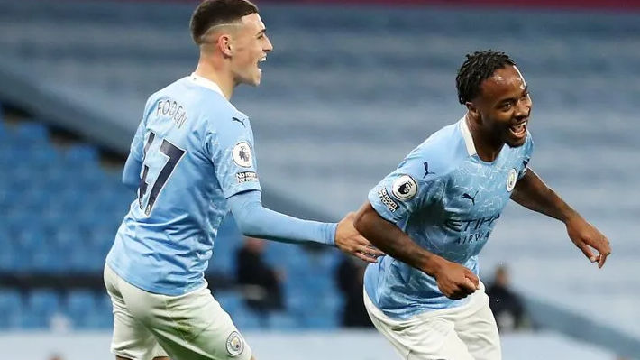 Raheem Sterling strike sees Manchester City hold off Arsenal in Premier League