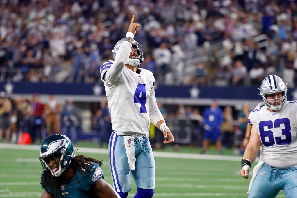 In 1st home game since injury, Prescott guides Cowboys to win over Eagles