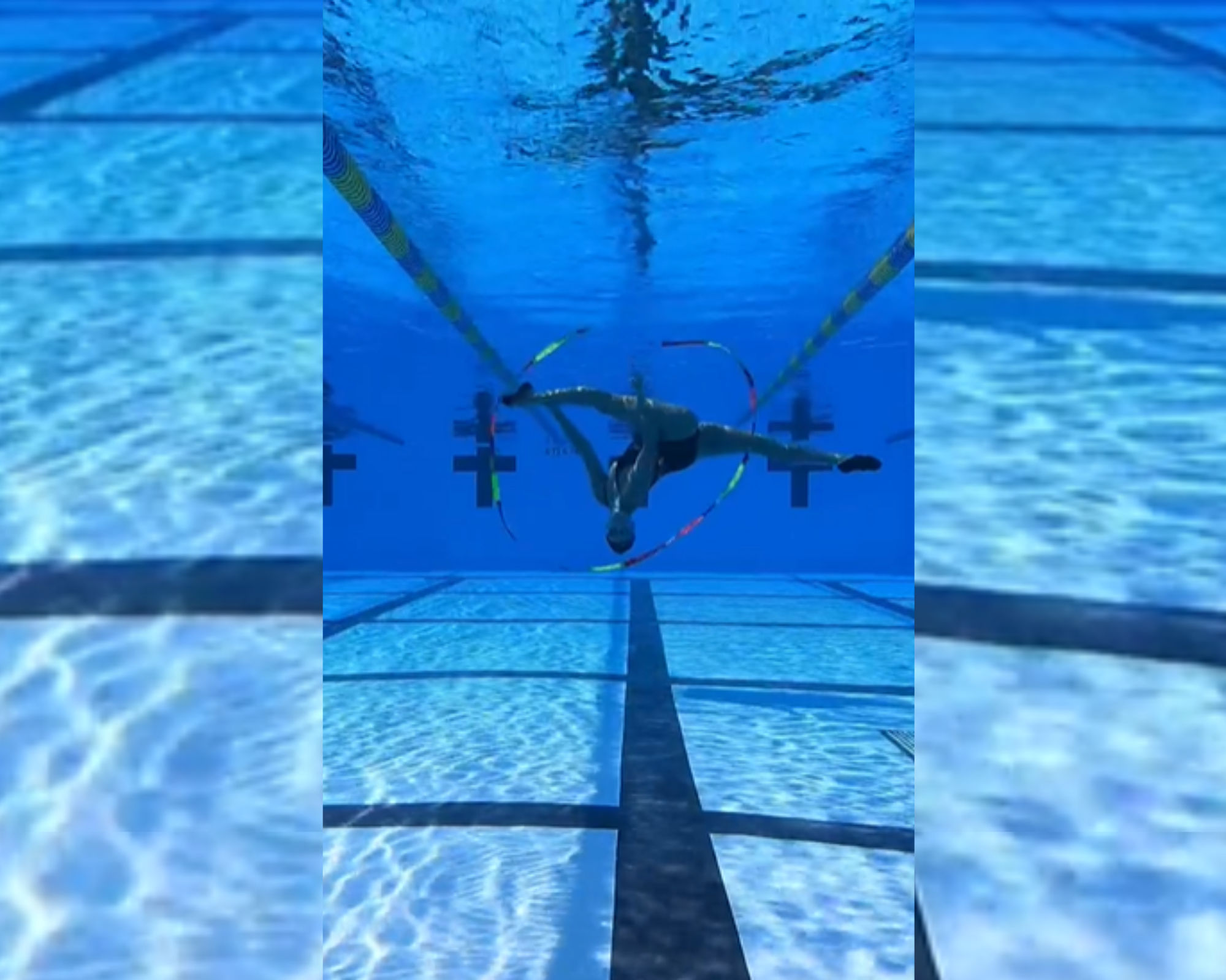 Watch this stunning video of a woman performing underwater gymnastics