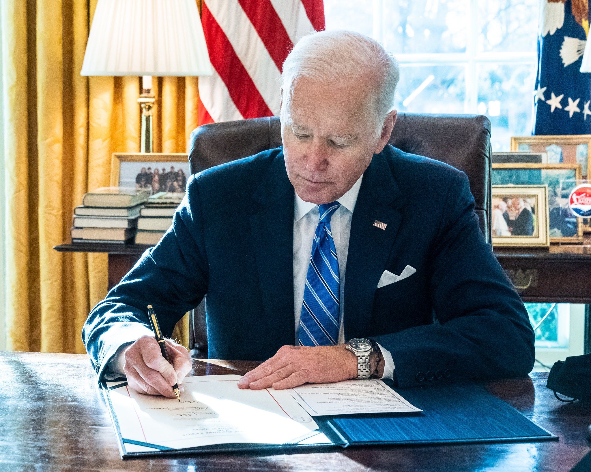 Joe Biden signs legislation pushing US borrowing limit by $2.5 trillion