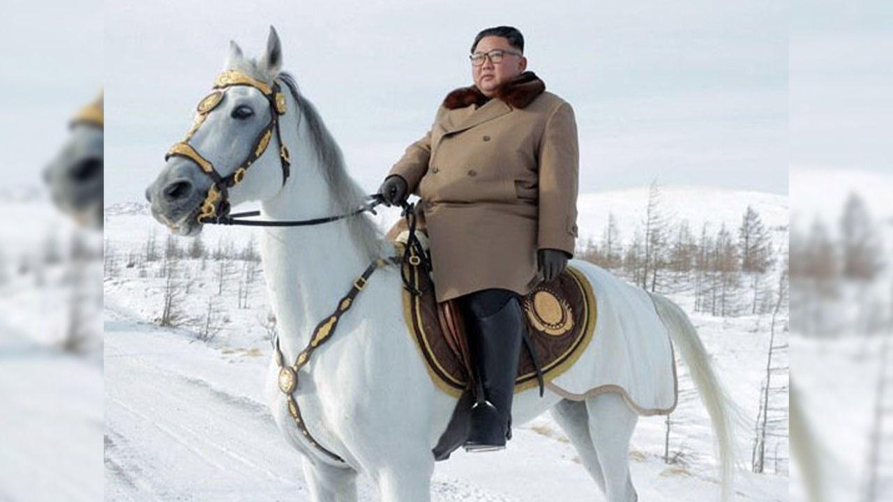 North Korea’s Kim Jong Un poses in military uniform with gun in new portrait