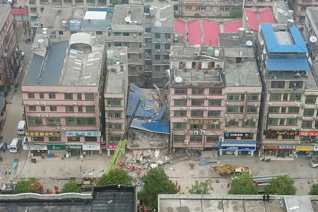 7 pulled from China building collapse after Xi vows rescue ‘at all costs’