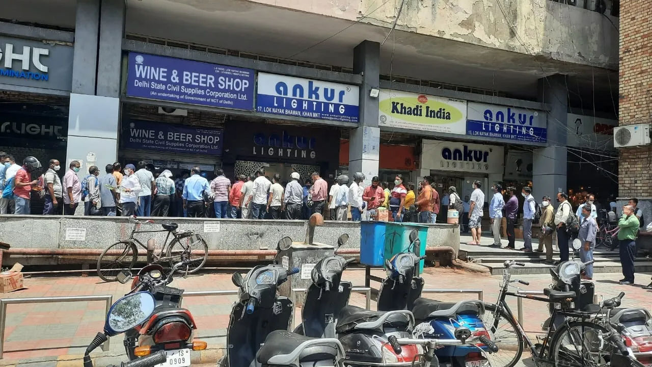 Helps keep negativity out of mind,: Queues at Liquor shops after lockdown order