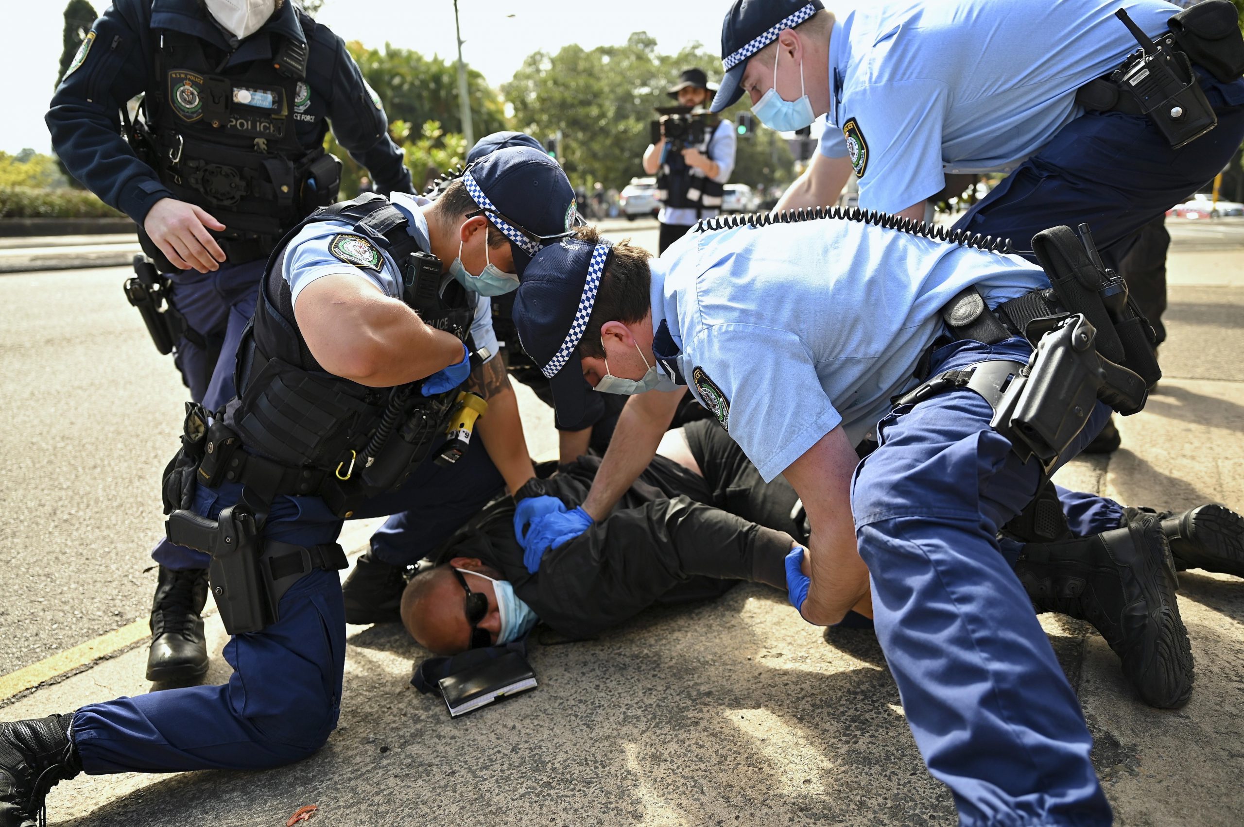 Police arrest two anti-lockdown leaders across Australia, New Zealand