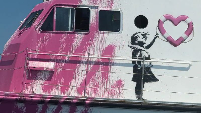 Italian coastguard comes to aid of Banksy-funded rescue boat