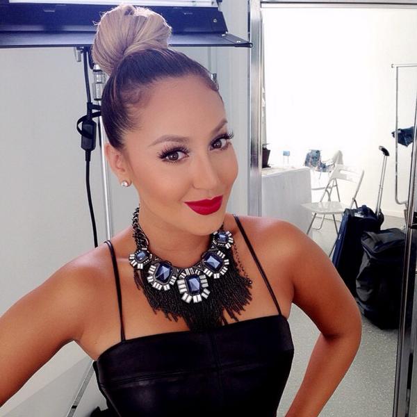 Who is Adrienne Bailon Houghton?