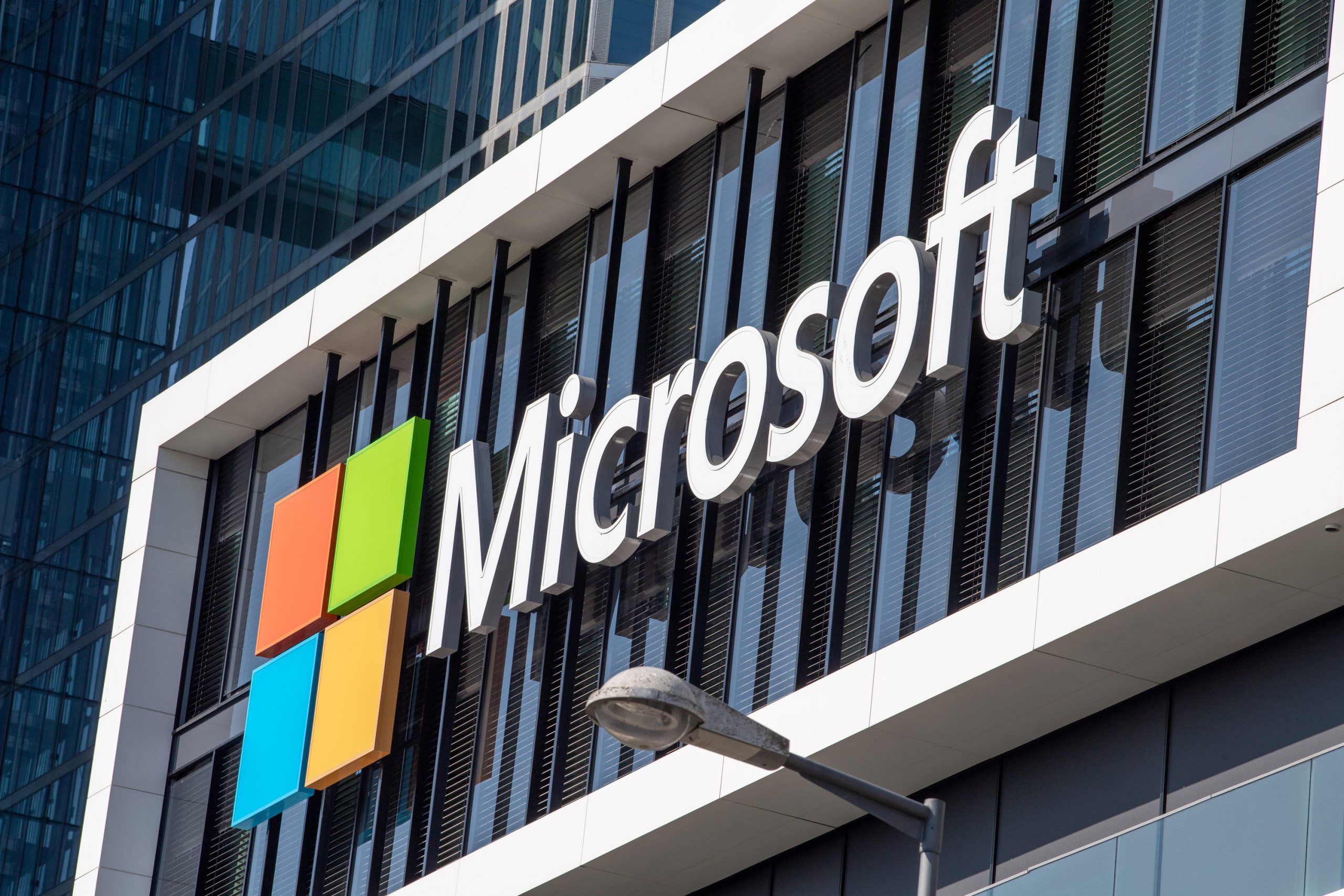 Why is Microsoft laying off over 10,000 employees?