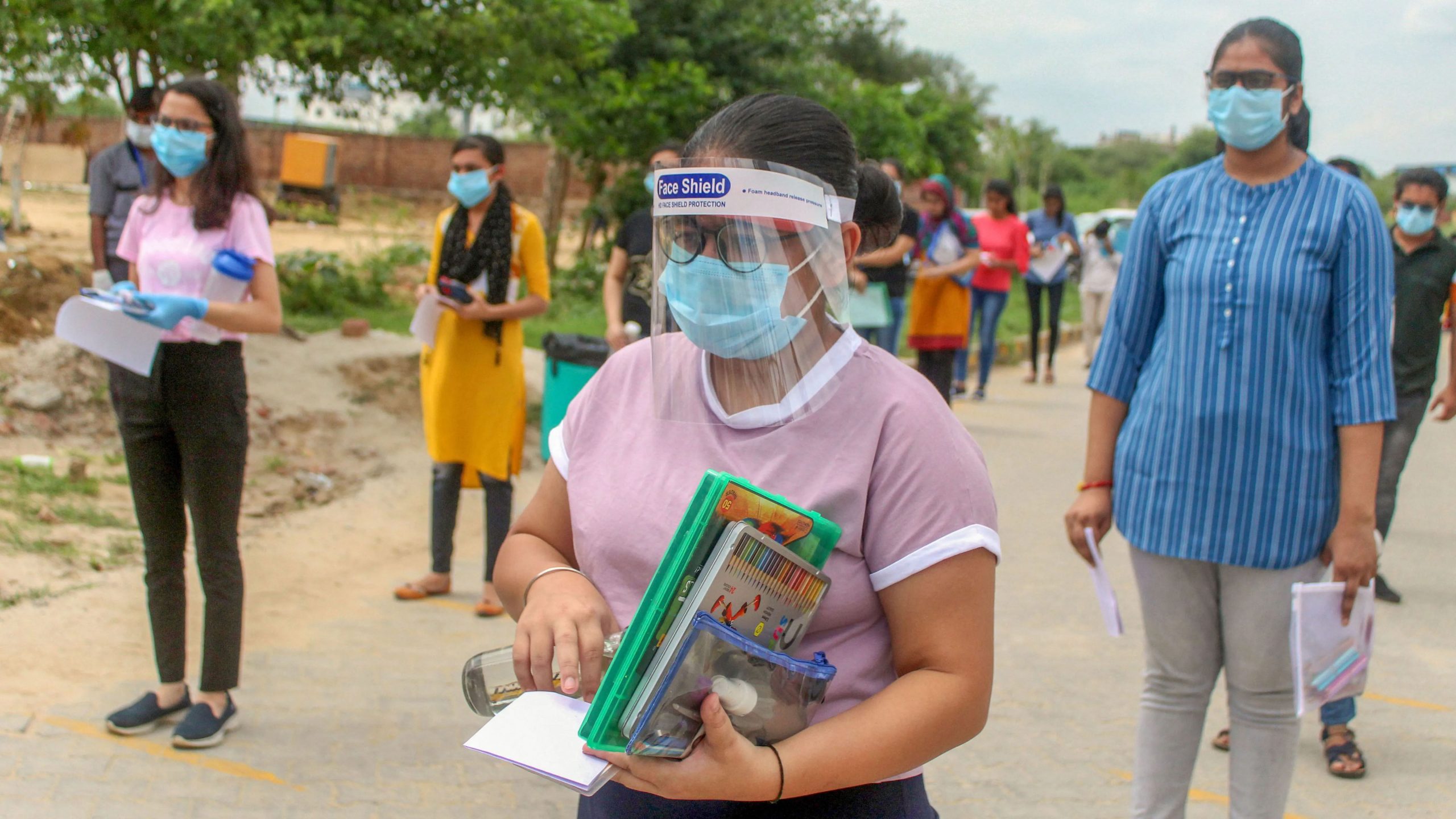 NEET 2020: Candidates reach exam centres wearing masks, maintaining COVID-19 protocols