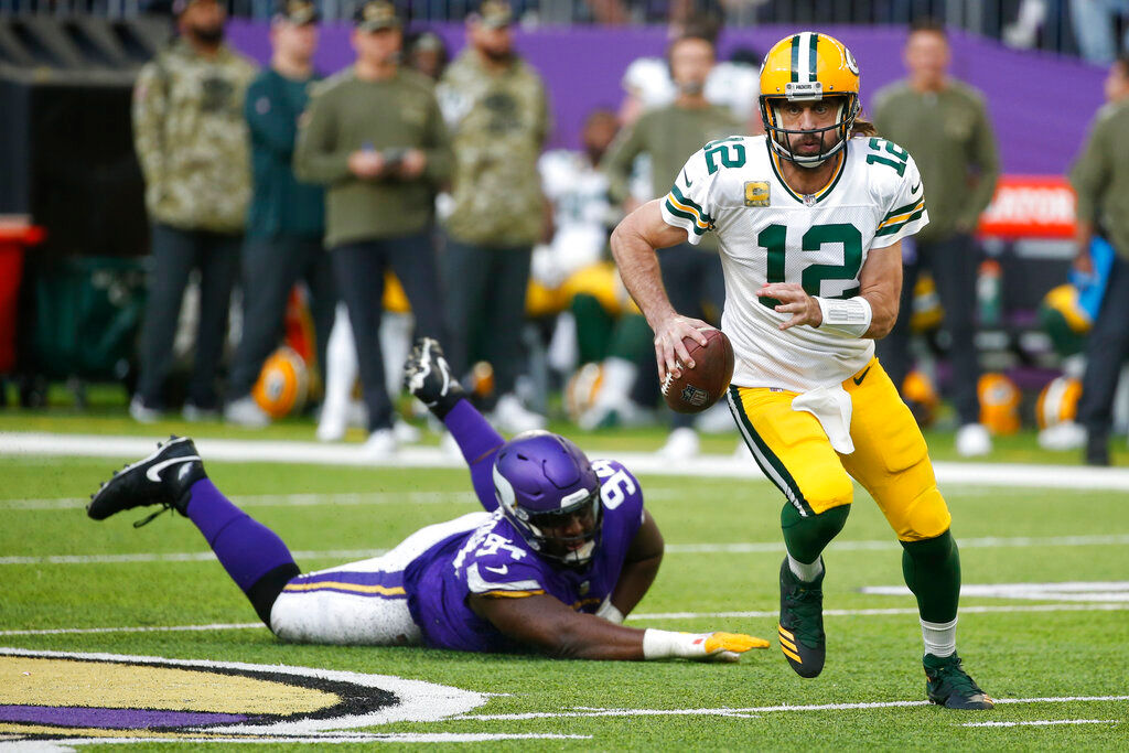 Packers QB Aaron Rodgers says he has been playing with a fractured toe