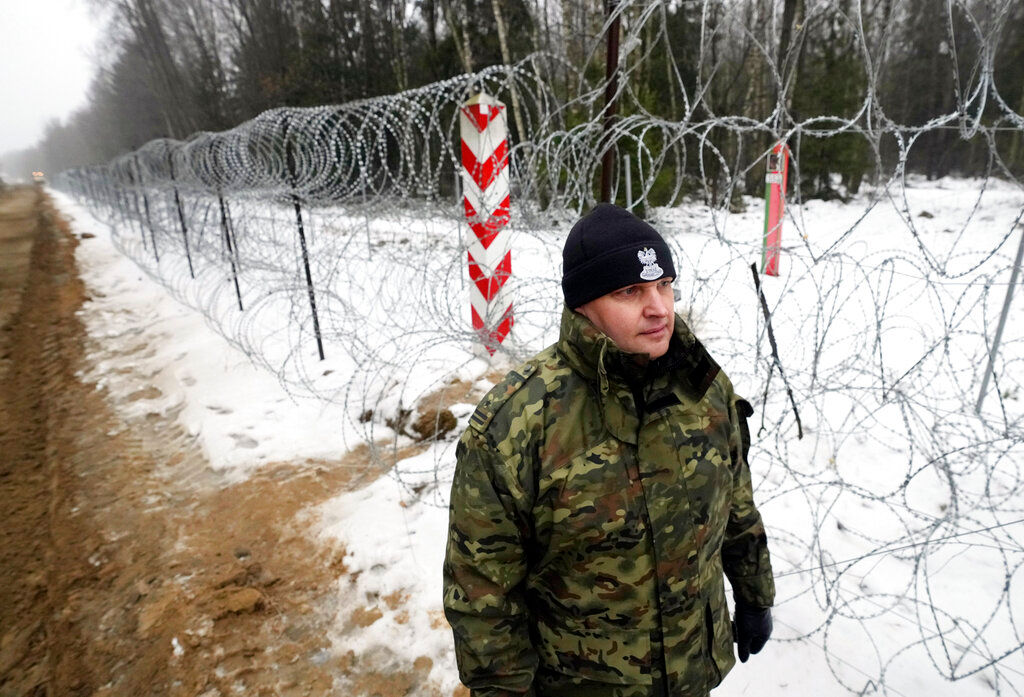 Poland takes a page from Trump, builds wall to keep Belarusian migrants out