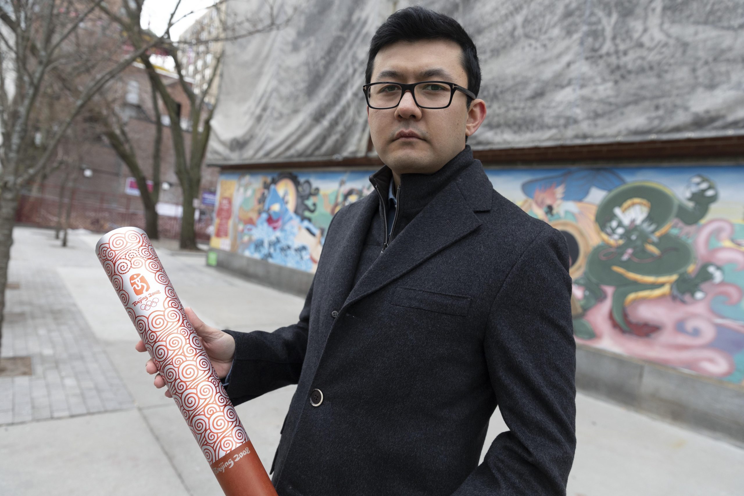 For Uyghur torchbearer, China’s Winter Olympics flame has gone dark