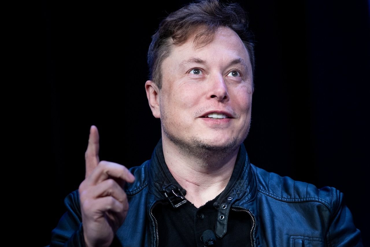Elon Musk takes a dig at Tim Cook’s post about new Apple store