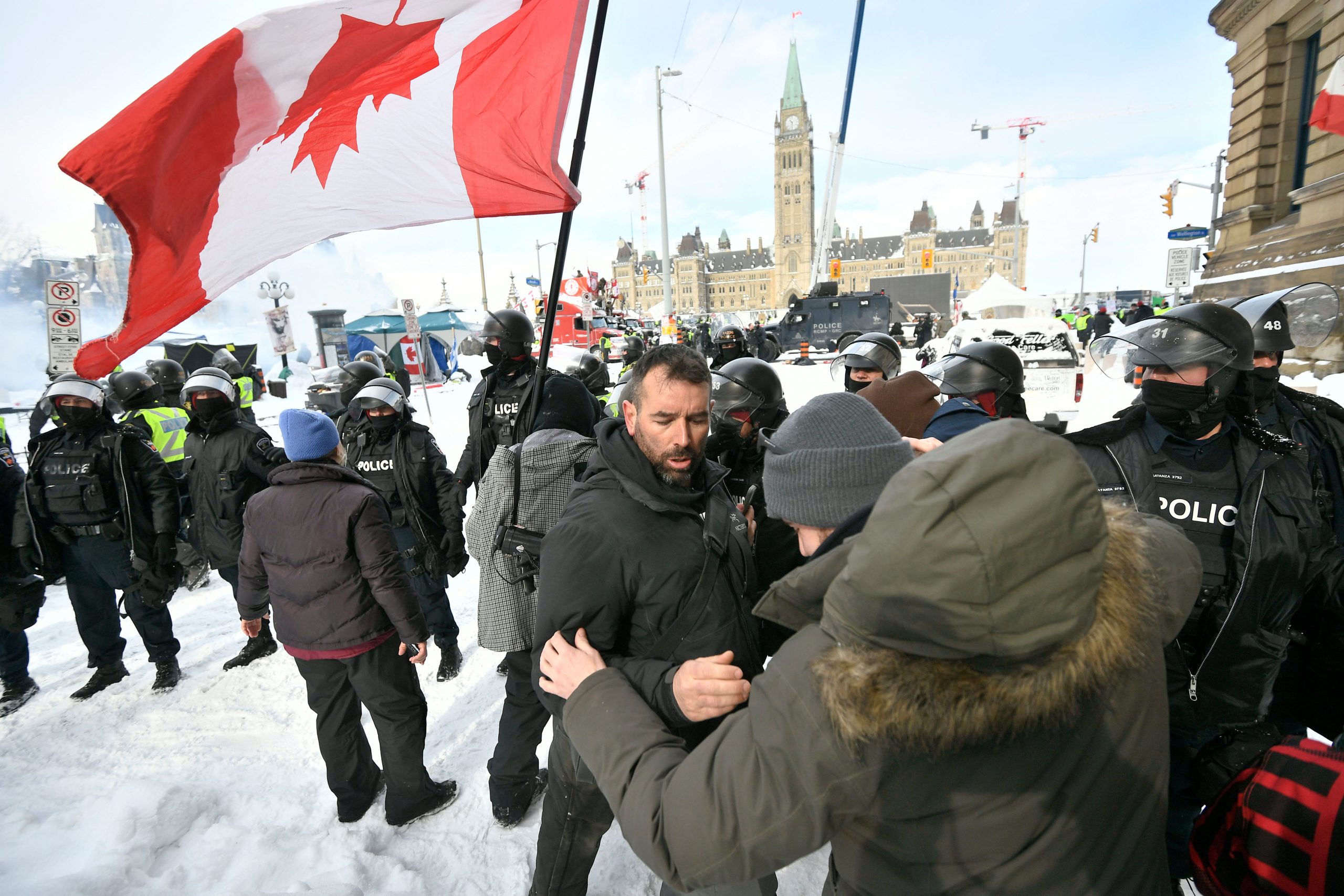 Canada police use stun grenade, pepper spray to clear protests in Ottawa