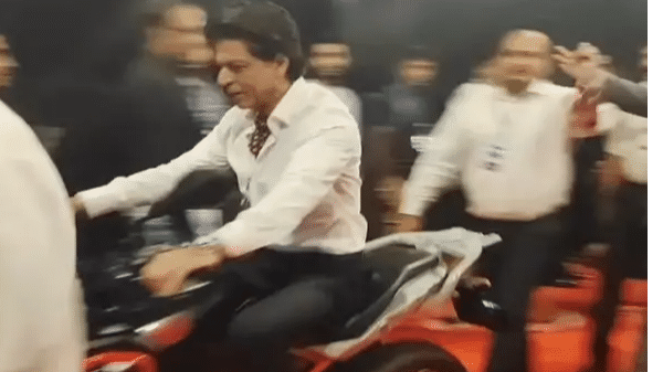 Shahrukh Khan back with a bang, makes grand entry on bike at Umang 2022
