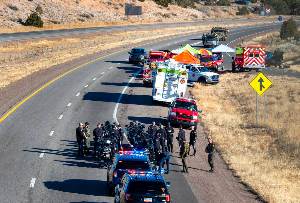 New Mexico cop killed in chase of kidnapper; suspect at large