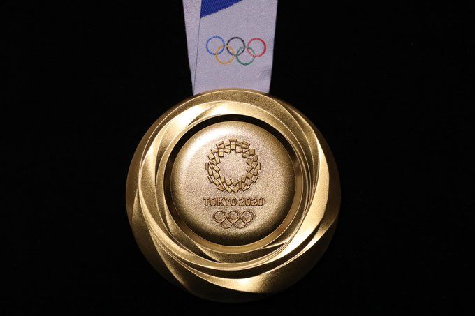 In a first, Olympic winners to put medals around their necks on their own