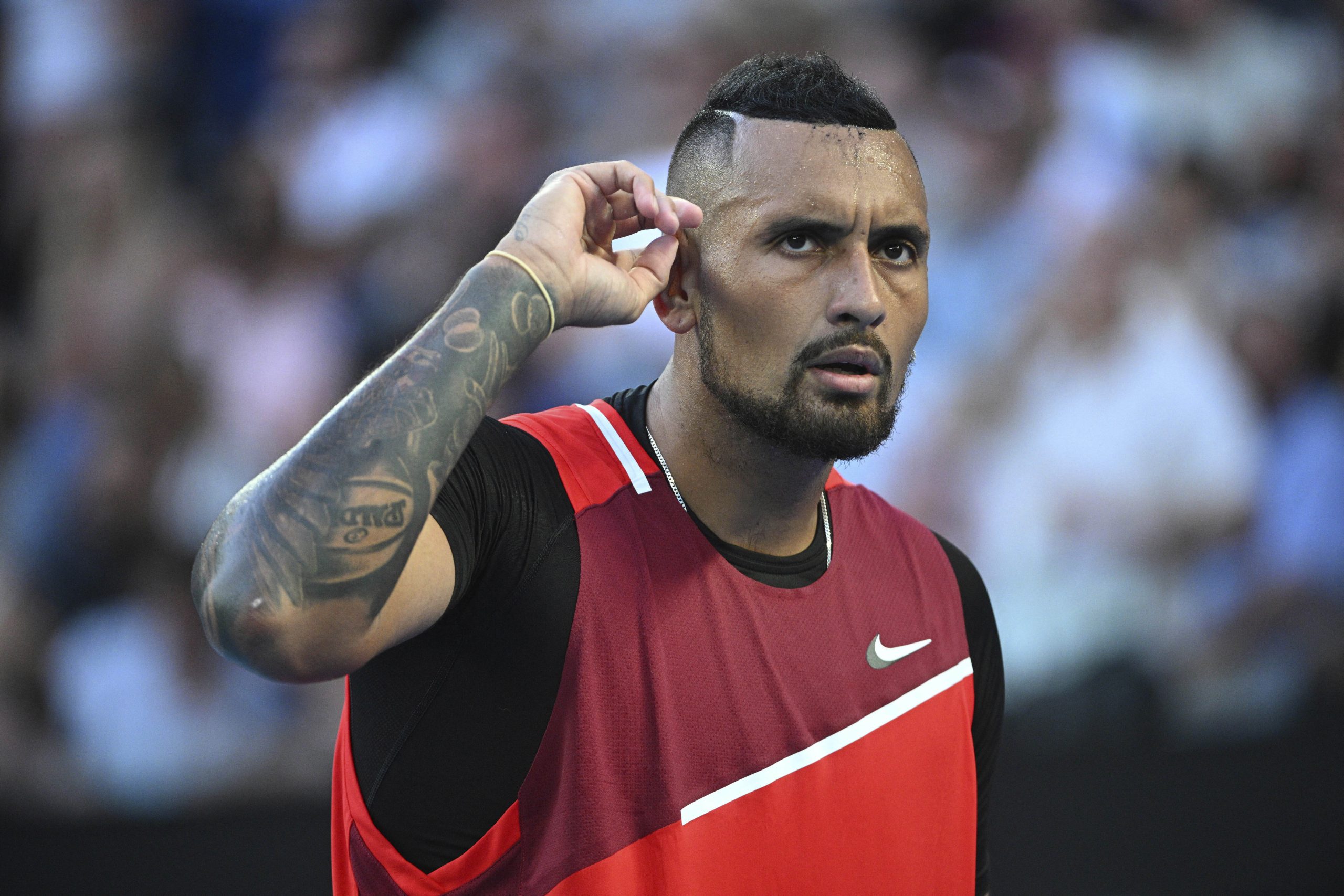 Watch: Nick Kyrgios accidentally hits young fan, gifts racket to console him