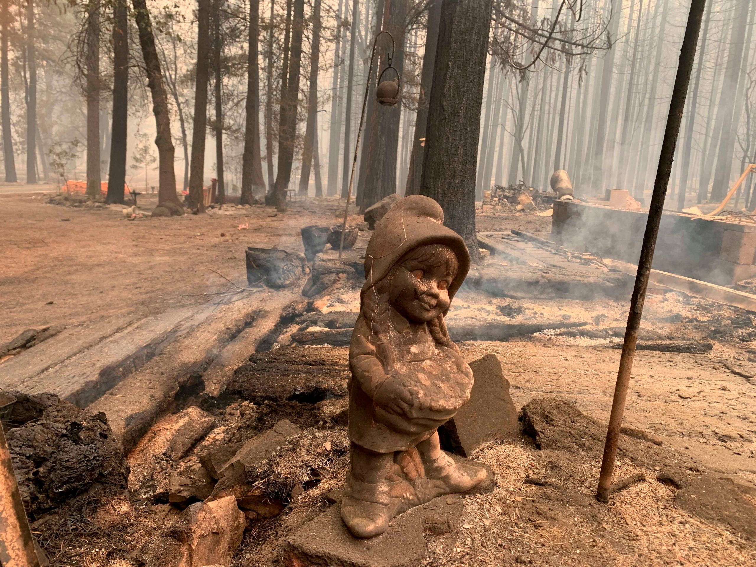 California wildfire threatens homes as blazes burn across West
