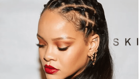 Rihannas fashion show sparks debate after braiding white models hair