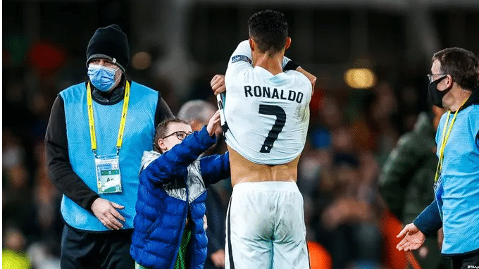 Ronaldo gifts shirt to young fan during  Portugal’s WC Qualifier | Watch