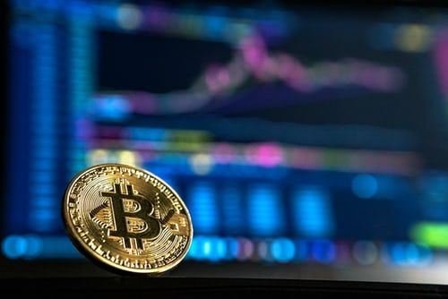 Bitcoin hits record high above $62,000