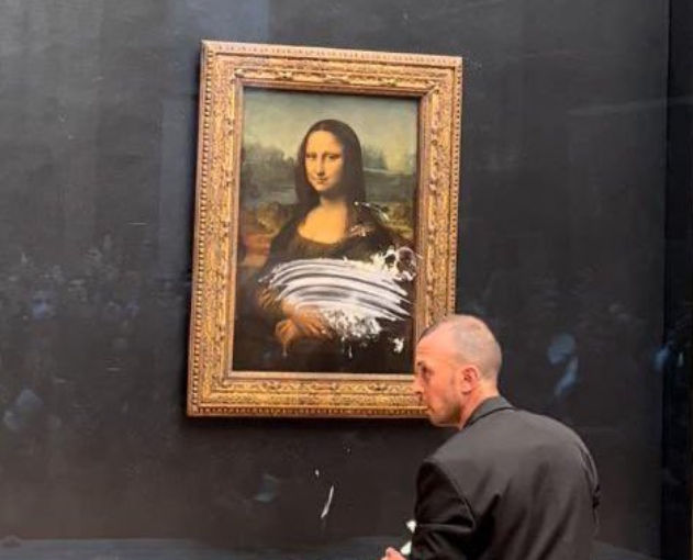 Cake thrown at Mona Lisa in bizarre show of environmental activism | Watch