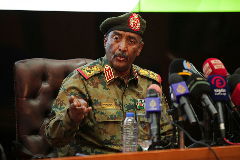 Sudan’s coup leader says prime minister detained for his own safety