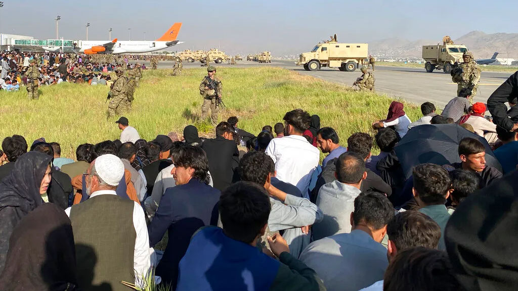 Afghans turn to land routes as Taliban take over Kabul airport