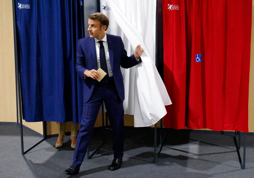 Emmanuel Macron’s centrists projected to keep their parliamentary majority
