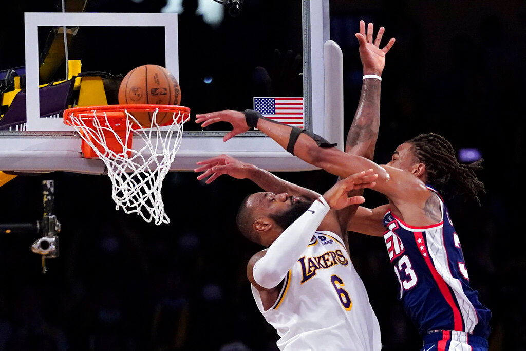 NBA: Claxton oops over James late, Nets hold off Lakers 122-115