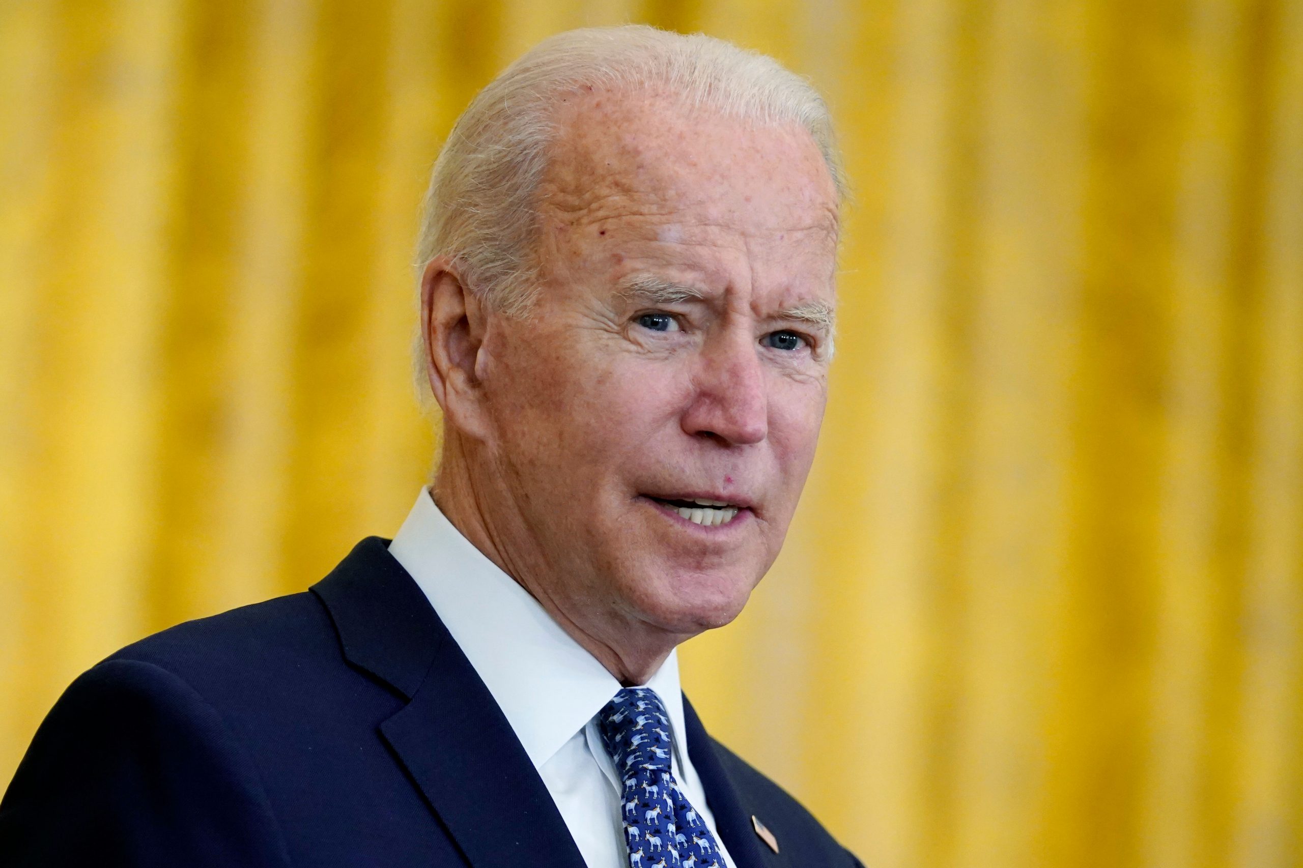 Biden credits Trump for COVID vaccines, says they agree on booster shots